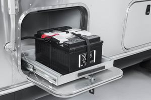 Batteries on pull out tray
